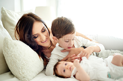 Buy stock photo Happy, mother and children in bedroom with care, love and bonding together for connection. Woman, son and daughter at home with trust, smile embrace and affectionate for special family memory.