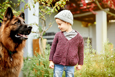 Buy stock photo Relax, dog and child in garden of home for love, bonding or support together. Animal care, calm and pet adoption with kid and German shepherd in backyard of house for weekend break and comfort