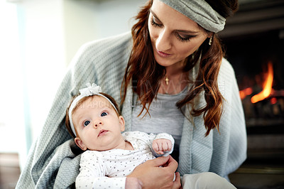 Buy stock photo Mom, relax and smile with baby in home for love, care or bonding together to nurture child development. Happy, woman or single parent with infant girl for growth, trust or comfort in family house