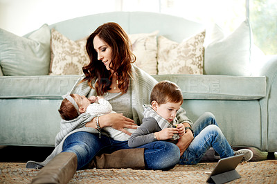 Buy stock photo Mom, baby and child with tablet in living room with education games for brain development. Parent, son and mother on floor in home with internet, streaming cartoon or app for entertainment or growth