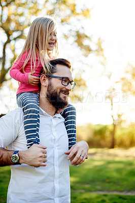 Buy stock photo Happy dad, lift or shoulder with child in nature for bonding, weekend or outdoor adventure together. People, kid or father carrying daughter with playful smile for holiday walk or family time in park