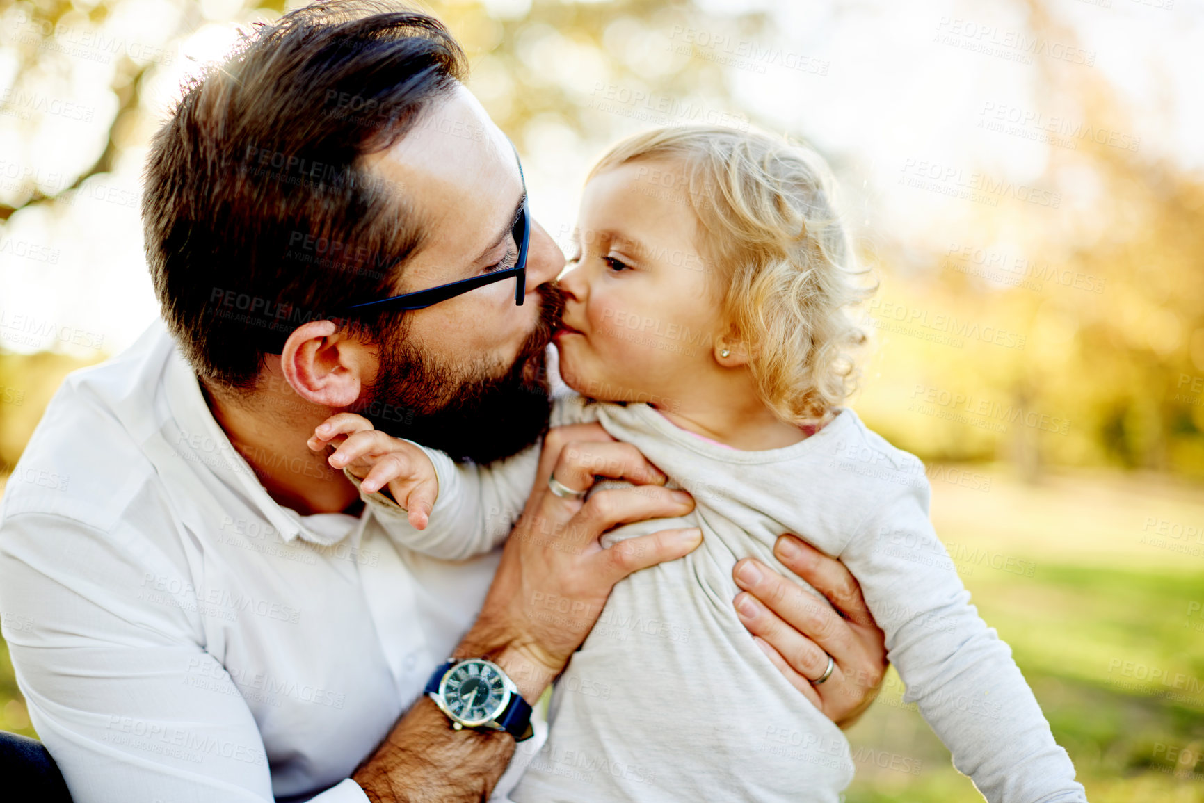 Buy stock photo Park, kiss and dad with girl for outdoor, relationship and connection together with smile. Happy family, father and child with love for bonding, support and trust on weekend holiday in nature