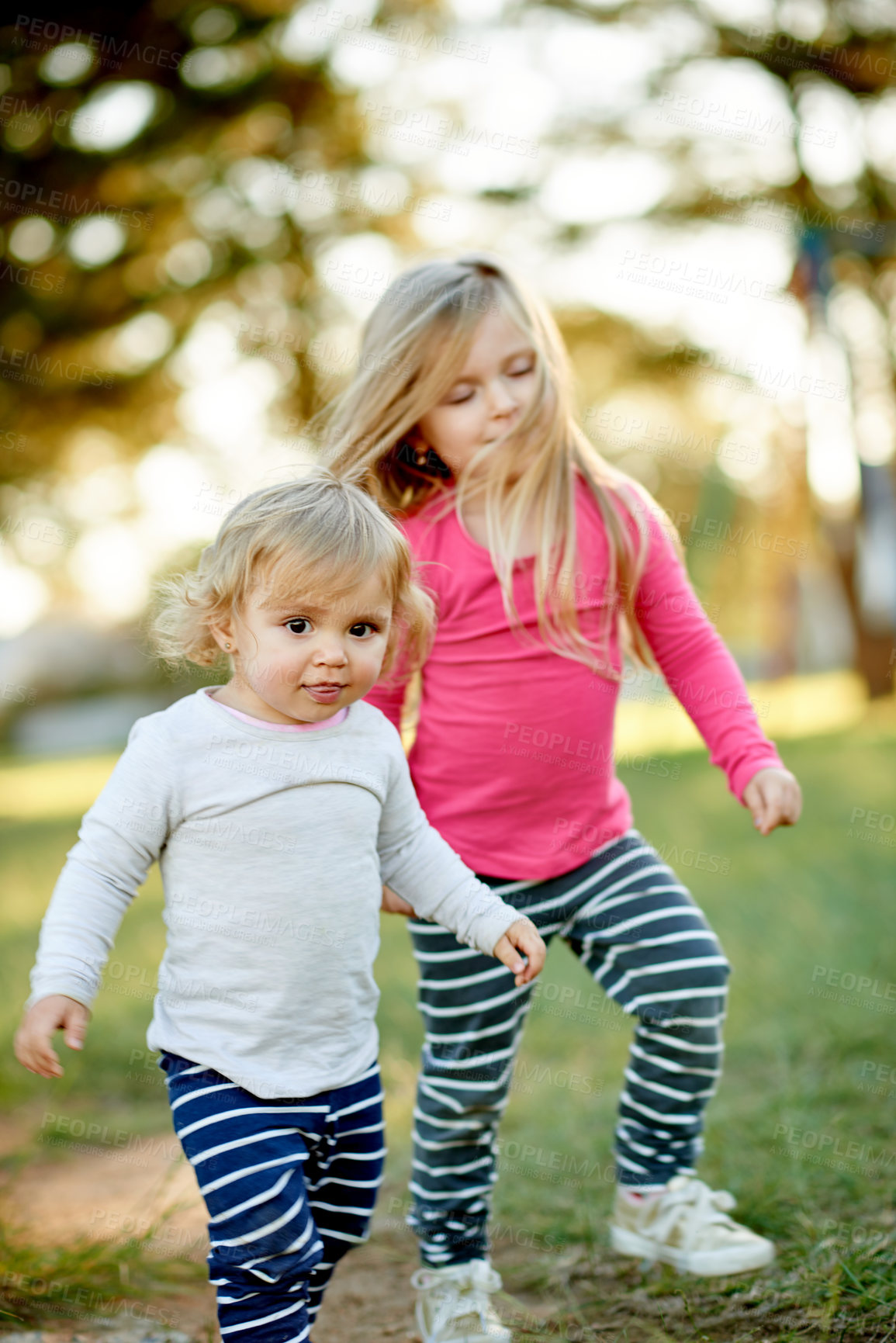 Buy stock photo Nature, running and children in park for holiday, weekend or vacation by trees for fun. Smile, activity and girl kids for playing outdoor on playground for hobby on grass in summer in backyard.