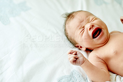 Buy stock photo Newborn baby, crying or bed with scream on sheet for nap time, pain or colic on space in home. Infant, child or kid shouting with eyes closed or emotion on duvet for irritation or hunger in house