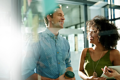 Buy stock photo Smile, team and business people planning on glass wall in office for brainstorming with event themes. Meeting, tablet and collaboration for project with schedule, coordination or laugh with flare