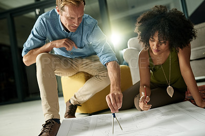 Buy stock photo Man, woman and compass for blueprint at office, team or night for interior design process at company. People, architect and flare for floor plan, renovation project and property development at agency