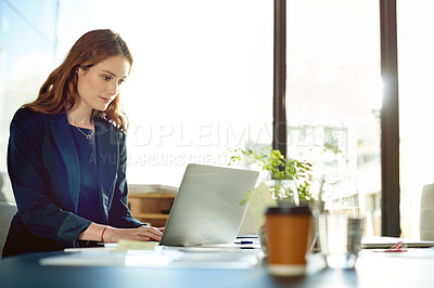 Buy stock photo Typing, laptop and business woman in company for investment banking, check email or research. Computer, happy banker and reading report in office for financial review, account info and economy news