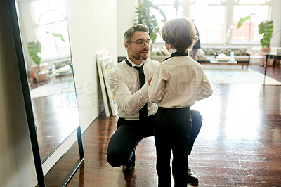Buy stock photo Home, father and son with mirror, necktie and explain with suit, event preparation and teaching. Family, parent or dad with boy, child development or learning fashion with help, talking or dressing
