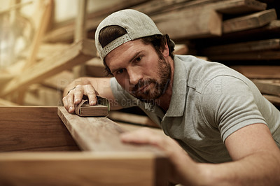 Buy stock photo Sandpaper, man and carpenter in workshop for woodwork for manufacturing furniture for business. Industry, artisan and male handyman with material for timber with industrial project for diy in factory