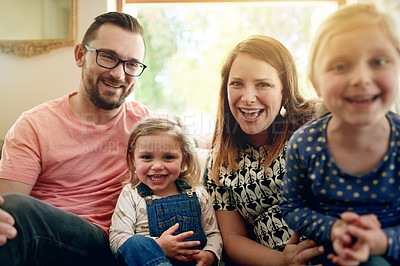 Buy stock photo Hug, portrait and relax of family on sofa in living room of home together for bonding or love. Happy, smile or trust with mother, father and daughter children in apartment for development or security