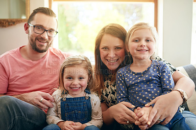 Buy stock photo Portrait, security and smile of family on sofa in living room of home together for love or trust. Break, happy or hug with mother, father and daughter children in apartment for bonding or development