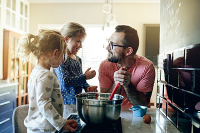 Buy stock photo Baking, talking and father with girls, learning and bonding together with recipe, smile and mixing bowl. Family, parent and dad in kitchen, daughters and help with ingredients, home and development