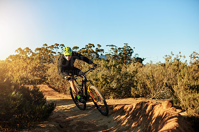 Buy stock photo Mountain bike, training and man with fitness, dirt road and environment with competition. Hobby, adrenaline or cyclist with practice, travel or challenge with adventure, journey or nature with energy