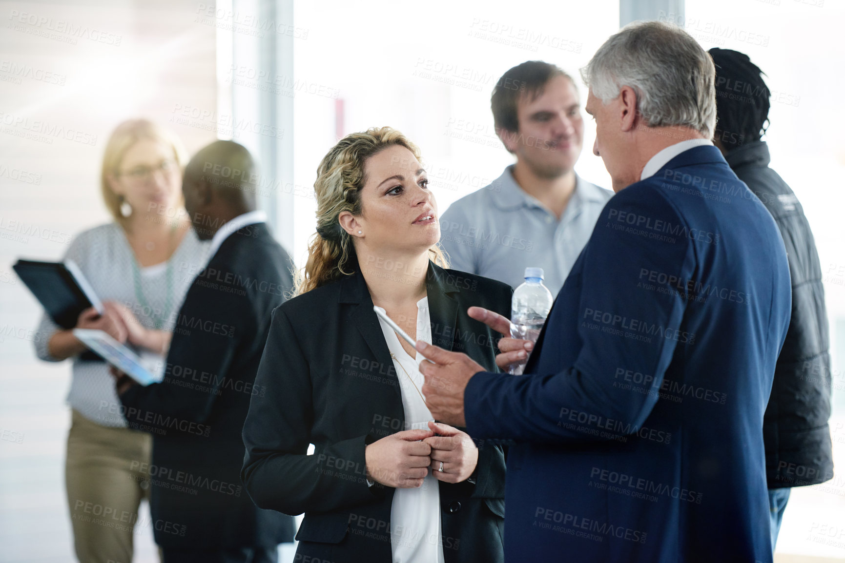 Buy stock photo Teamwork, event and speaking with business people in office for trading advice, partnership or investor. Stock market advisor, broker conference and feedback with employees in agency for discussion