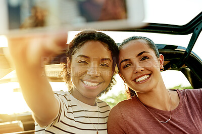 Buy stock photo Happy women, friends and car with selfie for travel, road trip picture or photography together. Female people, smile and capture moment with vehicle for outdoor memory, social media post or journey