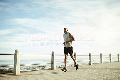 Buy stock photo Athlete, black man and running for exercise on promenade for fitness, cardio training and endurance. Male person, space and runner jogging for sports workout, marathon practice and pace for wellness