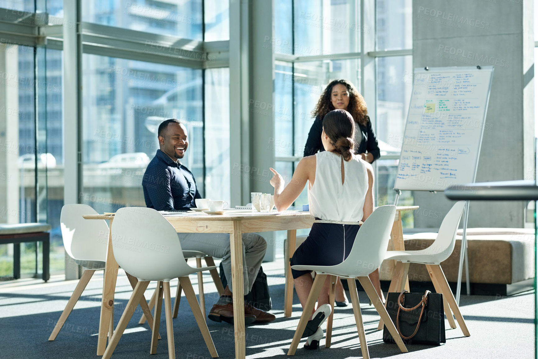 Buy stock photo Meeting, business people and planning for presentation in office, compliance proposal or laugh. Presenter, training or discussion with happy team to review policy, explain strategy and funny joke