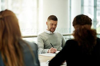 Buy stock photo Business, man and writing notes in meeting for planning, article ideas and schedule reminder. Person, employees and notebook for feedback, brainstorming and headline information on story publication