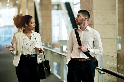 Buy stock photo Business people, conversation or walk in lobby for finance, advice or company goals discussion. Communication, colleague or financial advisor in office with coffee, collaboration or feedback.