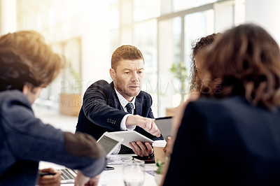 Buy stock photo Meeting, team and businessman with tablet for proposal, review policy and discussion in office. Planning, collaboration and group with technology for compliance idea, brainstorming and feedback