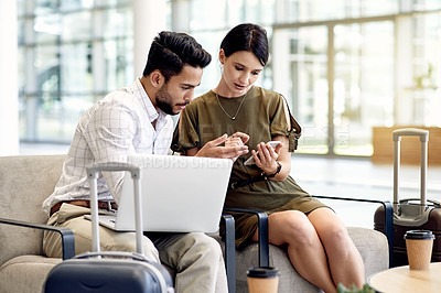 Buy stock photo Laptop, travel and phone with business people in airport lobby for planning, vip lounge and research. Conference trip, conversation and collaboration with man and woman in airline club for email