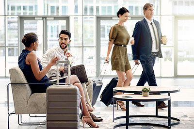 Buy stock photo Laptop, suitcase and meeting with business people in airport lounge for planning, conference trip or research. Luggage, travel and networking event with employees in lobby for teamwork and discussion