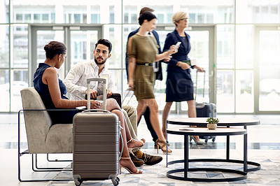 Buy stock photo Business trip, team and people with laptop, airport and planning for international seminar and chat. Colleagues, man and woman with tech for schedule updates, suitcase and luggage in waiting room