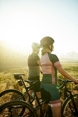 Buy stock photo View, fitness and bicycle with couple in nature for triathlon training, sports athlete or team. Cardio workout, cycling partner and resting stop with back of man and woman outdoor for flare and space