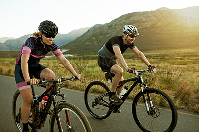 Buy stock photo Travel, cycling and fitness with couple in nature for race team, bike athlete or cardio workout. Triathlon training, adventure and bicycle with man and woman on countryside road for health and sports