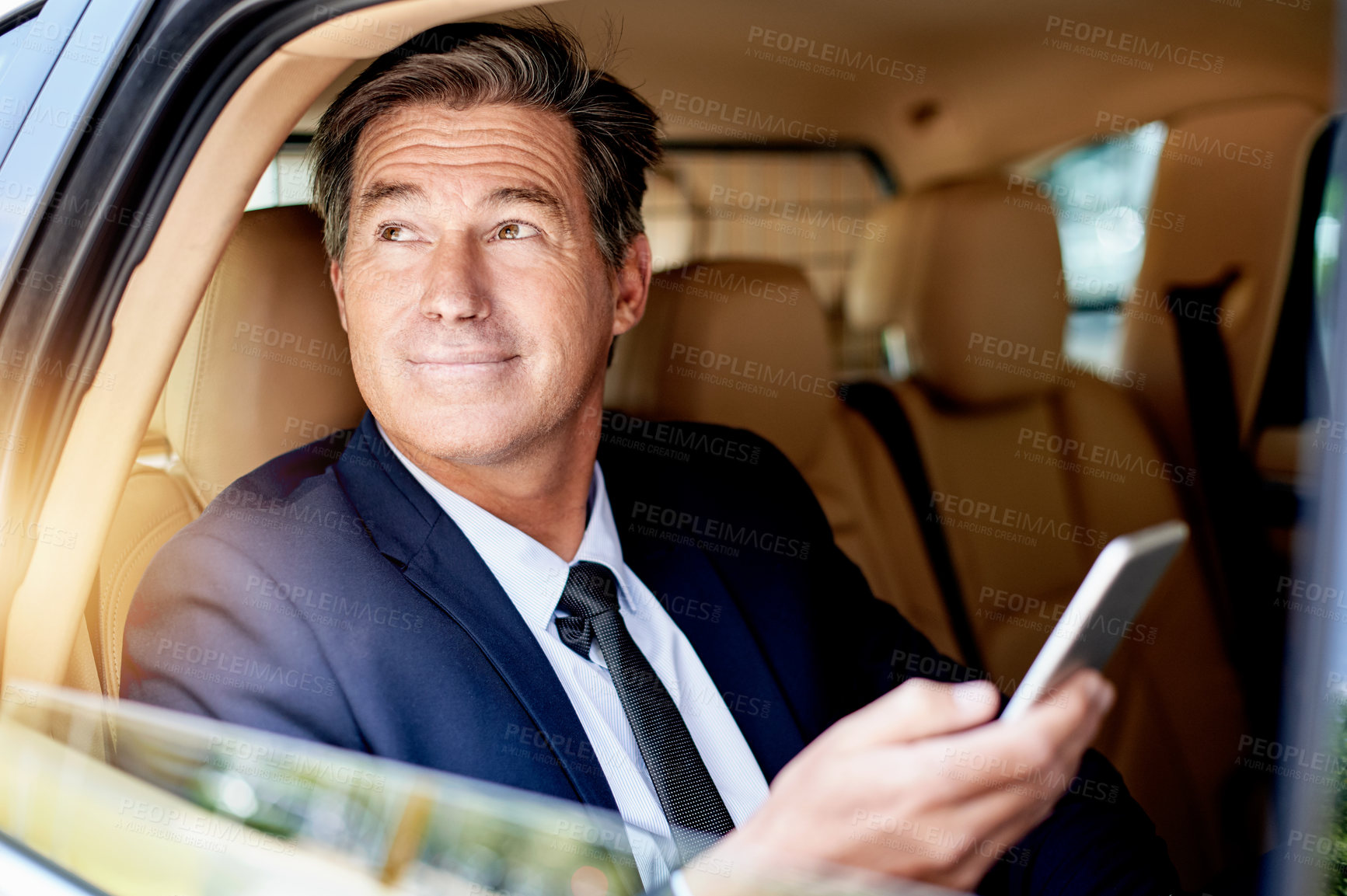 Buy stock photo Phone, thinking and businessman in car with communication, networking or email online for career. Smile, cellphone and mature male corporate manager with contact on app in vehicle for transport.