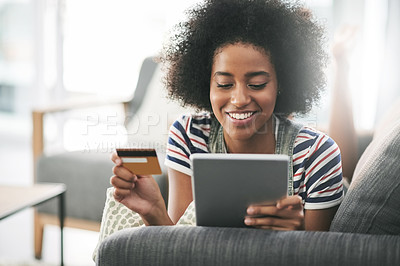 Buy stock photo Happy, black woman and credit card with tablet for payment or ecommerce app on sofa in home. Female person, shopper or user with smile, debit or technology for online shopping, buy or remote banking