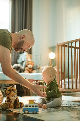 Buy stock photo Love, playing and child care, man and baby on nursery floor, new dad and infant bonding with toys. Family, play and young father with kid in bedroom with development toy in playroom at home together.