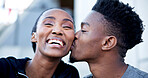 Laughing, happy and black couple with kiss in city for funny joke, humor or outdoor bonding together. Active, man and woman with smile, relationship or comedy for love or support in an urban town