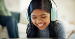 Child, headphones and listening with music in home for audio streaming or sound entertainment. Happy girl, kid or smile with online network, connection or app for subscription, internet or podcast