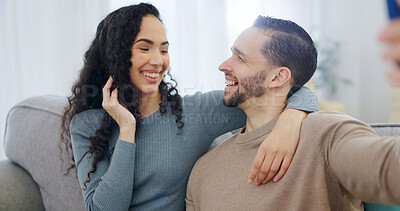 Buy stock photo Happy, couple and hug with selfie in home for photography, bonding memory or weekend together. Man, woman and laughing with smile, humor or capture moment for picture, holiday or funny joke in house