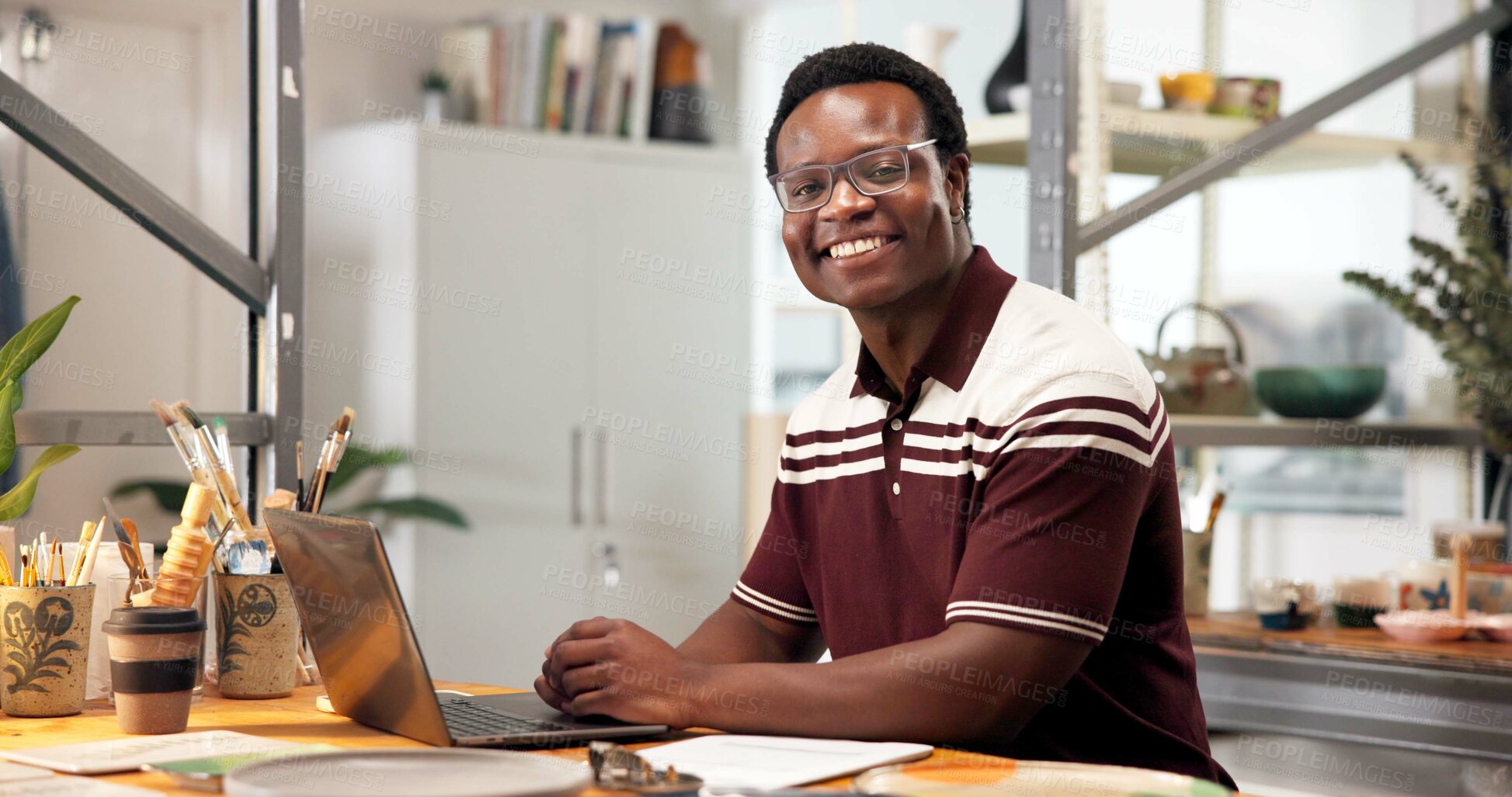 Buy stock photo Laptop, portrait and man in pottery workshop, craftsmanship and small business owner with smile. Computer, ceramic artist and happy black person in studio, creative artisan and pride at startup