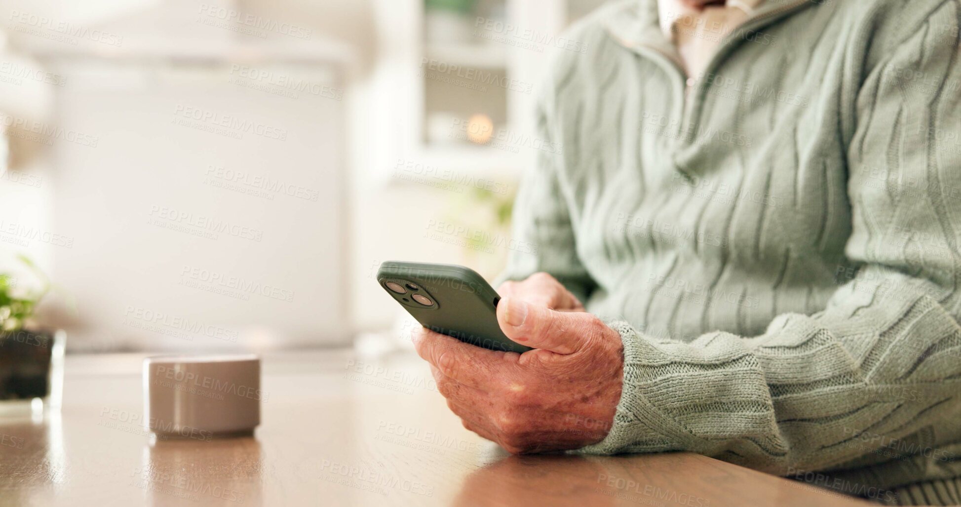 Buy stock photo Hands, phone and old man in house with research, retirement planning and browse for life insurance. Space, senior person and connectivity in home with tech, website and mobile app for policy cover.