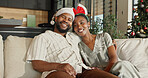 Christmas, portrait or black couple with smile in home for festive celebration, comfort or holiday. Happy, man and woman relaxing on sofa for December vacation, weekend or bonding together in house