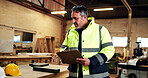 Inspection, man or clipboard in workshop for carpentry safety, helmet condition or PPE review. Checklist, mature inspector and hazard assessment for impact incident, hardhat expiry date and hse audit