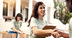 Donation, volunteer or happy woman with handshake for charity, checklist or fundraiser campaign. Female person, activist or shaking hands with smile for community service or outdoor outreach together