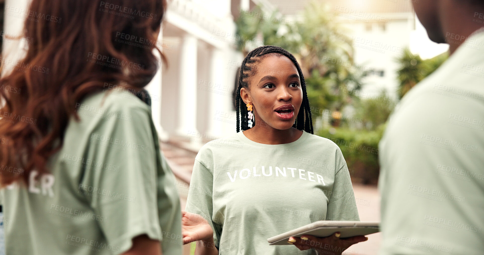 Buy stock photo Volunteer, woman or tablet outdoor with meeting, share project info or assign task for charity event. NGO, team leader and digital for group coordination, fundraising schedule and outreach management