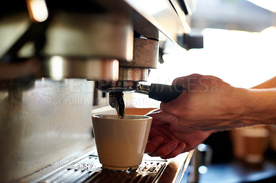 Buy stock photo Hands, waiter and cup at machine in cafe for brewing coffee, order preparation or hospitality. Restaurant, service and person with portafilter for premium blend process, latte drink or fresh caffeine