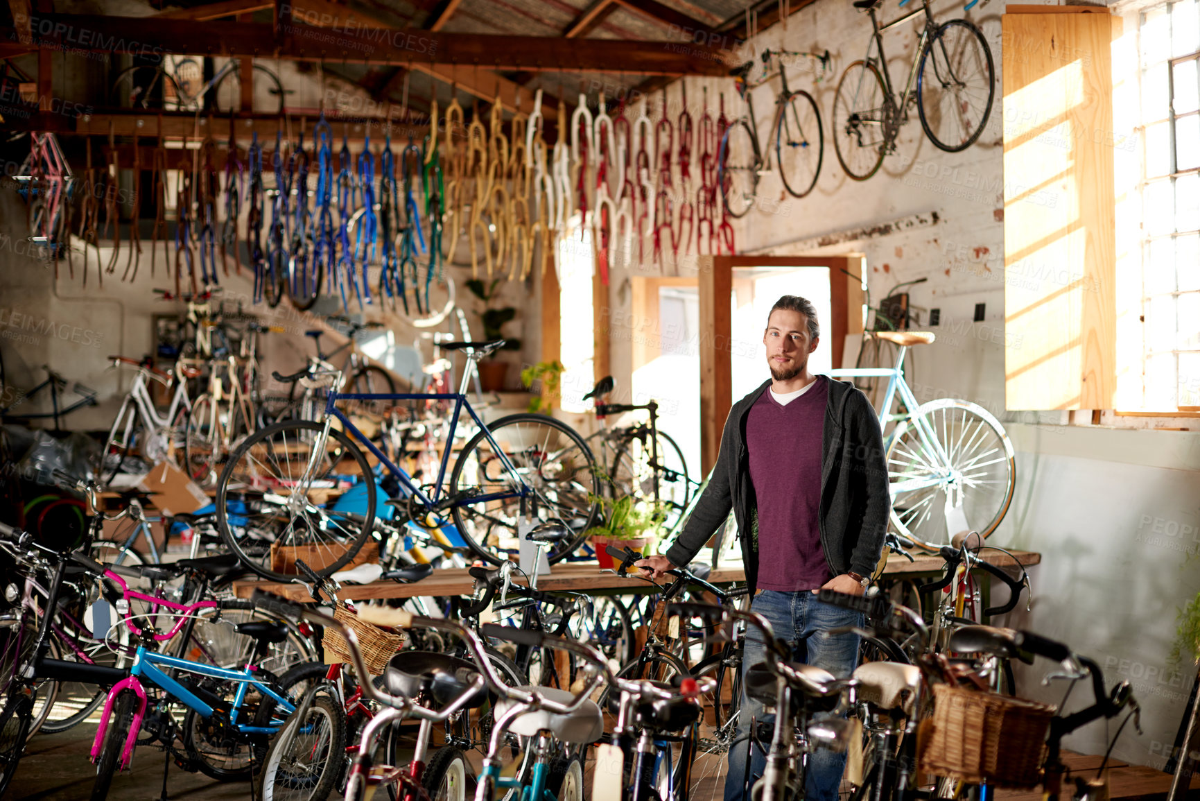 Buy stock photo Bicycle, business and portrait of man in store for fixing, repair and selling bike equipment. Startup, workshop and person with sustainable vehicle for maintenance, cyclist technician and mechanic