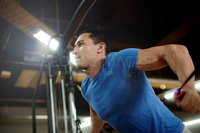 Buy stock photo Training, exercise and machine with man in gym for cable pulley, fitness and muscle development. Workout equipment, athlete and strong with intense person in sports club for bodybuilder reps