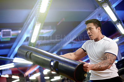 Buy stock photo Bodybuilder, workout and tube with man in gym for metal equipment, training and challenge. Health, athlete and wellness with strong person in sports club for weightlifting, exercise and muscle