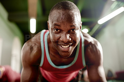 Buy stock photo Man, plank and workout with smile at gym with training in class, challenge or portrait with low angle. Personal trainer, exercise and balance with people for abdomen, fitness and bodybuilder at club