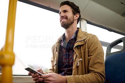 Buy stock photo Phone, thinking and happy man on bus for travel, journey and morning commute in low angle. Mobile, passenger and person in public transport for planning, navigation and reflection with idea on trip