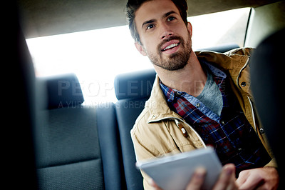 Buy stock photo Man, tablet and happy in car, taxi and search for direction on web, driving and travel on commute. Person, digital touchscreen and smile with application in vehicle, ride or online map for transport