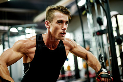 Buy stock photo Fitness, workout and man in gym with cable fly, exercise or training for body strength. Weight lift, challenge or athlete in studio with machinery, muscle growth or power for bodybuilding goal.