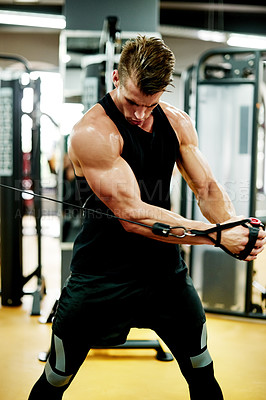 Buy stock photo Fitness, workout and man in gym with cable fly, exercise or training for body strength. Weight lift, challenge or athlete in studio with equipment, muscle growth or cardio for bodybuilding goal.